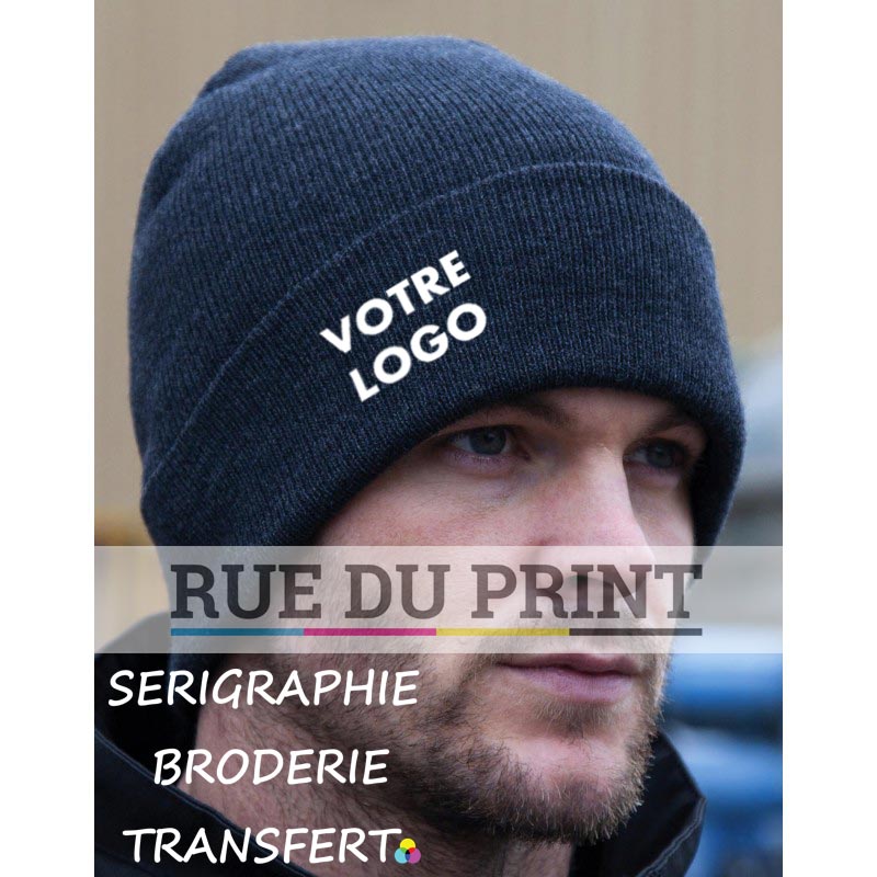 Gorro publicitario azul con logo de esquí en lana de punto 340% acrílica de 2 g/m100