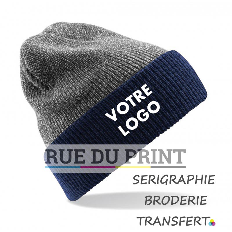 Gorra publicitaria Heather Grey-French Navy con logo Reversible Heritage 100% acrílico (suave al tacto)