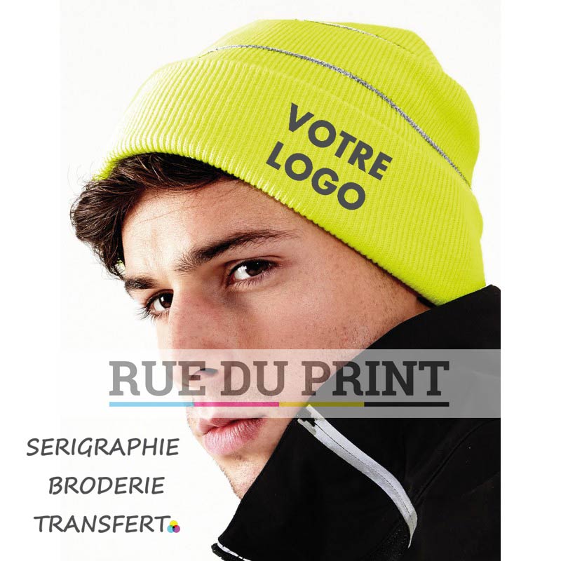 Gorra publicitaria Amarillo Flúor con logo con bandas reflectantes 100% poliacrílico (soft touch) bandas reflectantes
