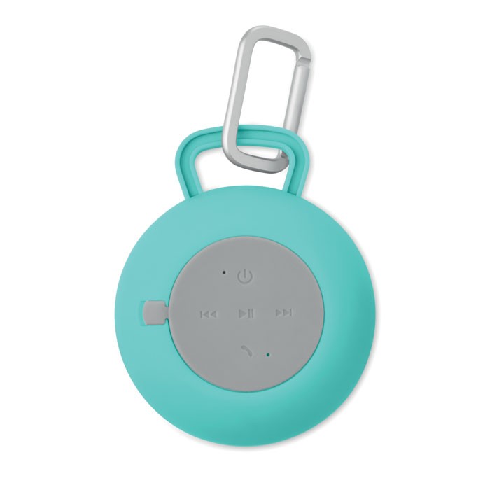 ROLL Haut-parleur personnalisé rond Bluetooth avec revêtement en tissu sur le devant et finition en caoutchouc.